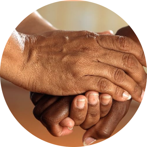 two black person's hands holding another black person's hand.